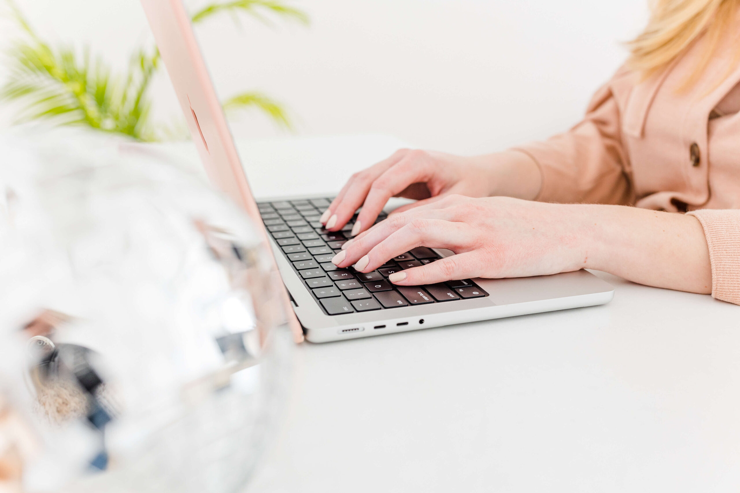 Woman typing on computer