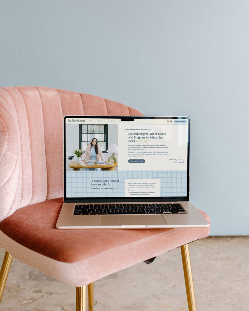 Laptop sitting on pink velvet chair showing website design for My Fiero Moment